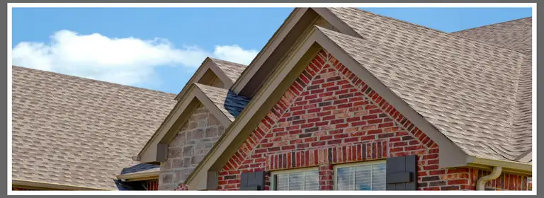 Metal and cedar roof installation completed by Armour Roofing